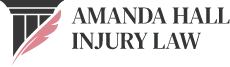 Logo for Amanda Hall Injury Law featuring a red feather overlaying a classical column, with bold serif text in uppercase spelling out the firm’s name, symbolizing justice, professionalism, and legal expertise.
