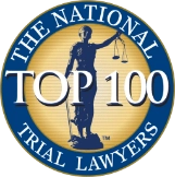 Circular badge for The National Top 100 Trial Lawyers featuring Lady Justice holding scales and sword, with bold blue and gold text symbolizing excellence, fairness, and distinction in the legal profession.